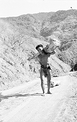 Loinclothed hobby; Obrzek dne - the picture od the day - awa rel - Philippines, Igorot man on road at Cordillera Central Mountains on northern Luzon island